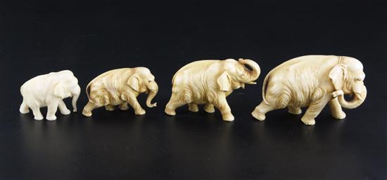 A Japanese graduated set of four ivory figures of elephants, length 5.2cm - 9.3cm